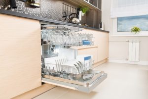 modern kitchen with loaded dishwasher